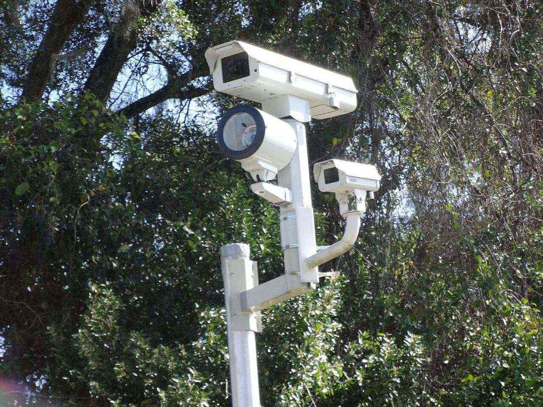 Traffic surveillance camera overlooking a roadway